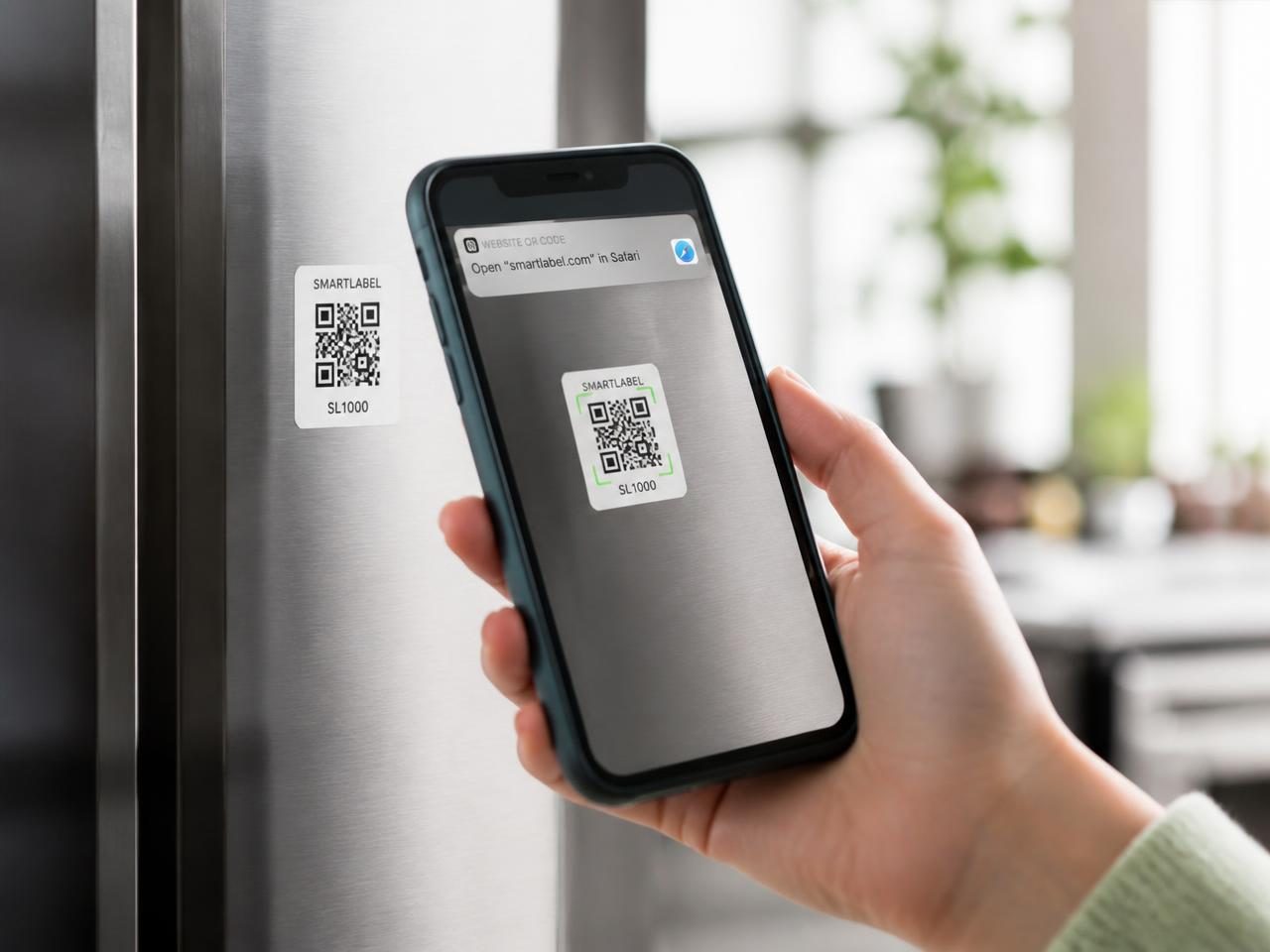 A hand holding a phone scanning a small printed QR label on an appliance